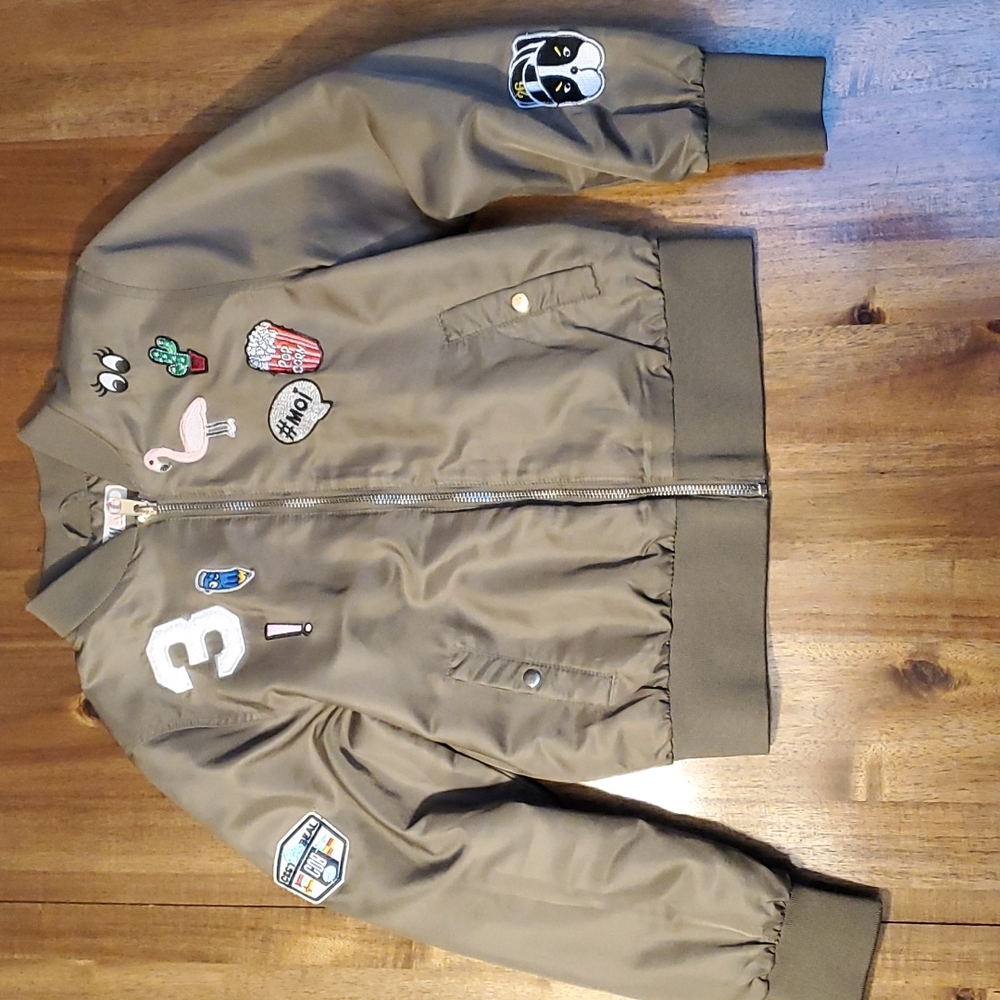 Child's green Bomber Jacket with patches.